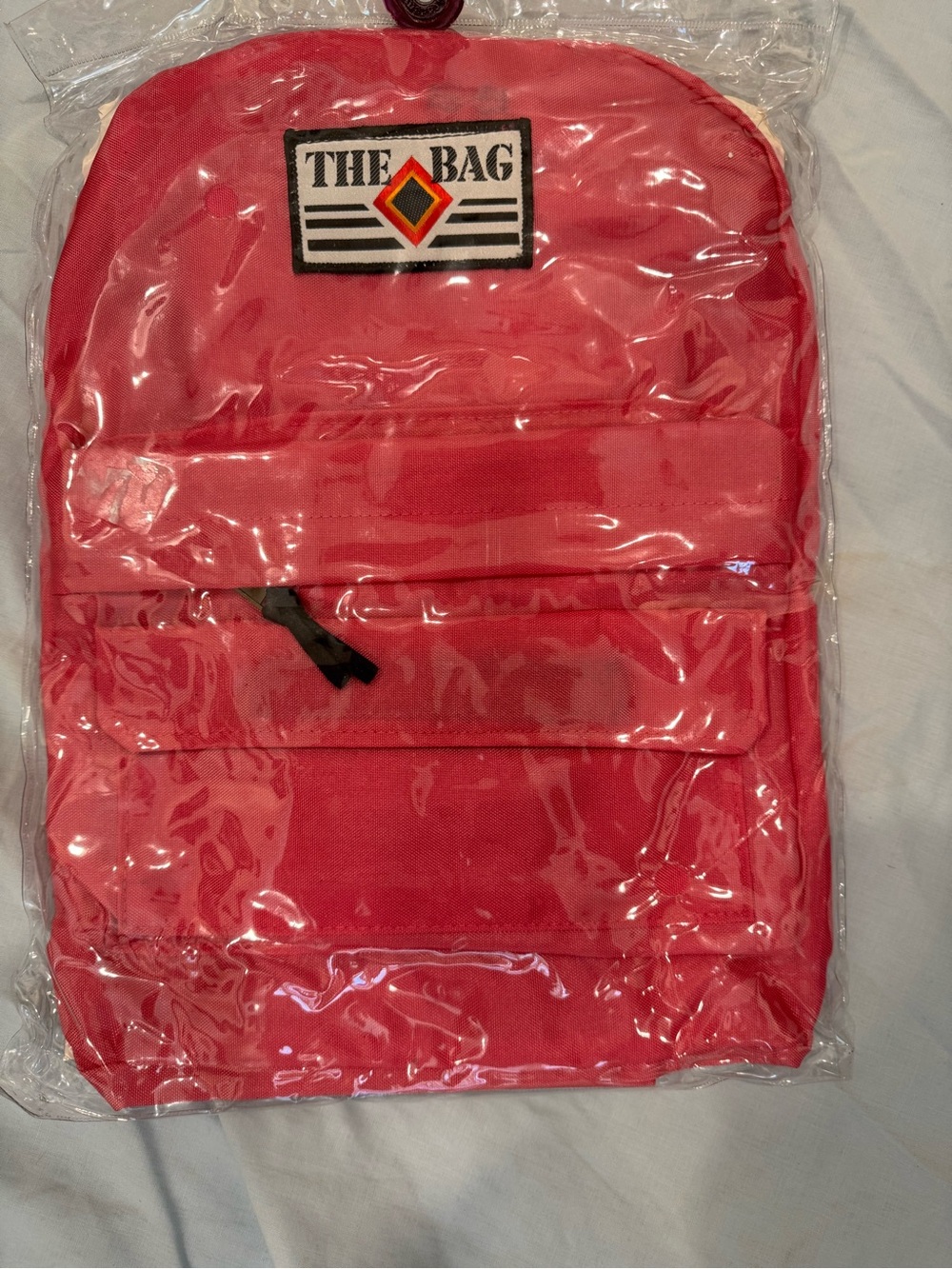 Vintage 1980s Sears “The Bag” backpack in bright pink, Model #98063.